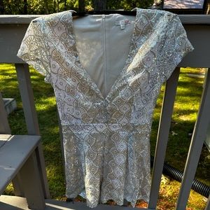 Never worn sequined jumper. Smoke free.